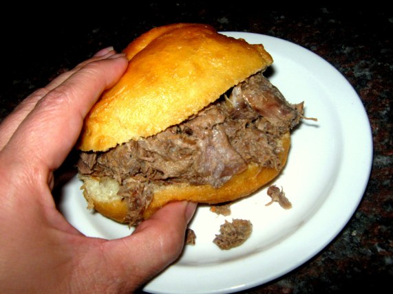 Afgekookte springbokvleis met vetkoek